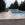 Lecomte Hydrobulles - Piscine 11 x 4 m avec plage en pierre reconstituée Manoir